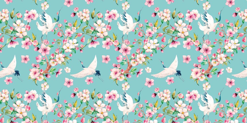 Żurawie pomiędzy różowymi kwiatami