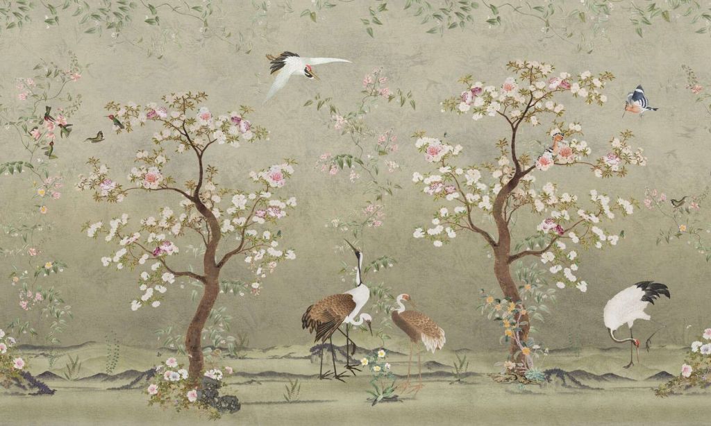 Kwitnące drzewa wiśni z żurawiami