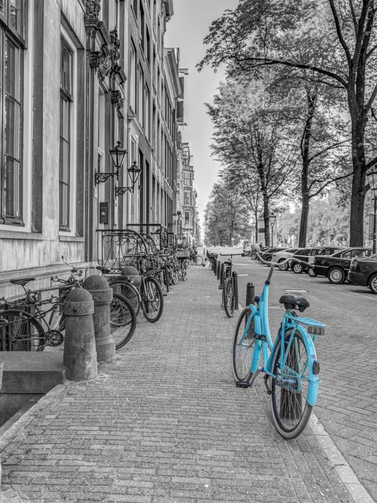 Rower zaparkowany na chodniku, Amsterdam